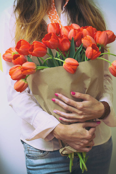 Girl and tulips  - 写真・画像