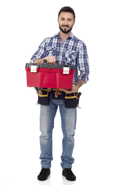 Handyman with toolbox - Foto, afbeelding