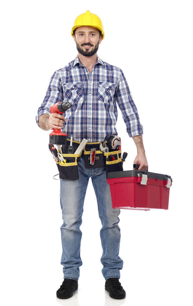 Handyman con caja de herramientas y taladro eléctrico
 - Foto, Imagen