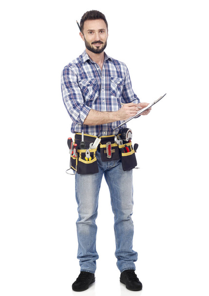 Handyman with clipboard - Photo, Image