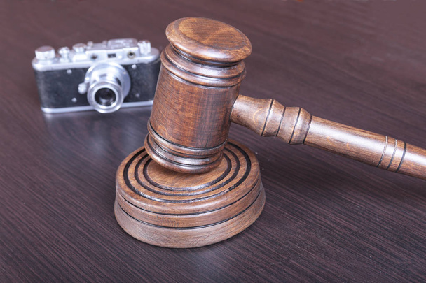 auction hammer , symbol of authority and vintage camera - Photo, image