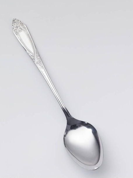spoon on white table - Фото, зображення