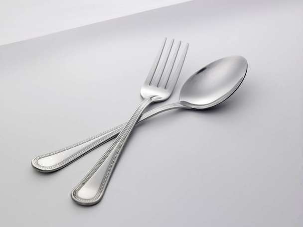 spoon and fork on table - Fotoğraf, Görsel