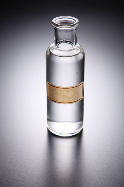 white vinegar in bottle - Fotó, kép