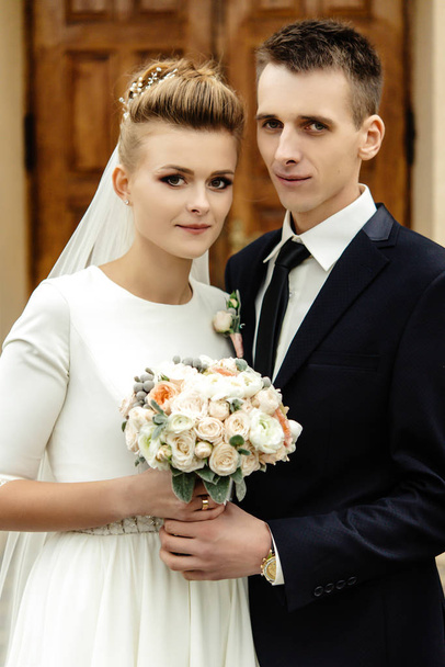 gorgeous bride and elegant groom - Фото, зображення