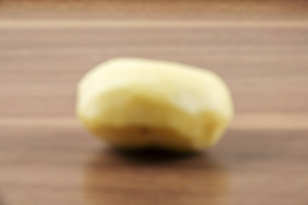 Fresh raw potato on wood table. - Photo, Image
