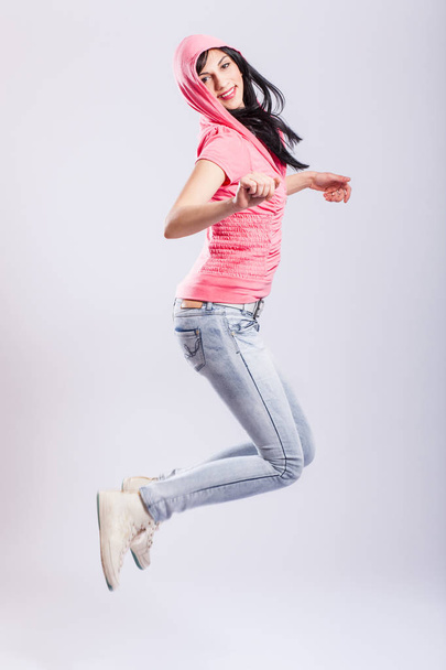 attractive young girl jumping - Φωτογραφία, εικόνα