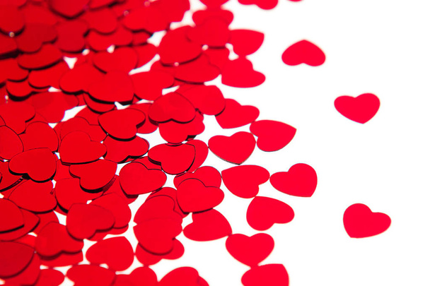 Valentines day border of red hearts confetti with copy space on white background. - Foto, immagini