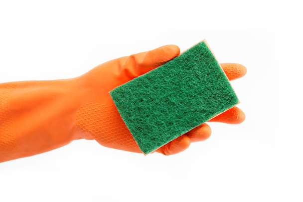 Hand in orange rubber gloves with sponge isolated on a white bac - Foto, Imagen