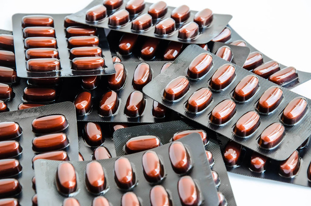 pílulas medicina em blister marrom
 - Foto, Imagem