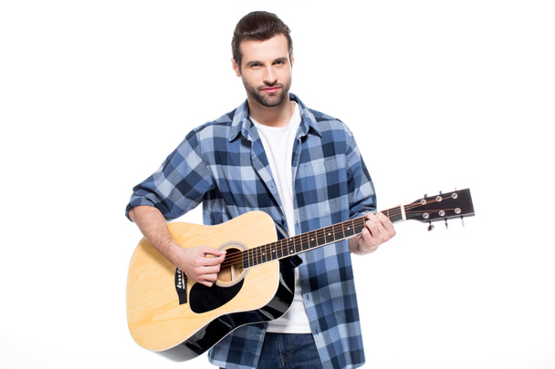 Young man with guitar - Фото, зображення