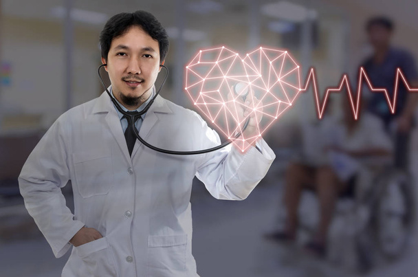 Asijské doktor ruky držící stetoskop - Fotografie, Obrázek