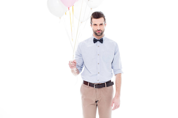 Hombre con globos de aire
 - Foto, Imagen