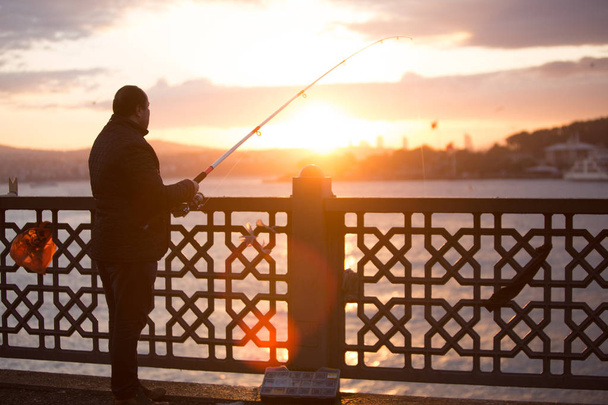 Fisherman on bridge - Photo, Image