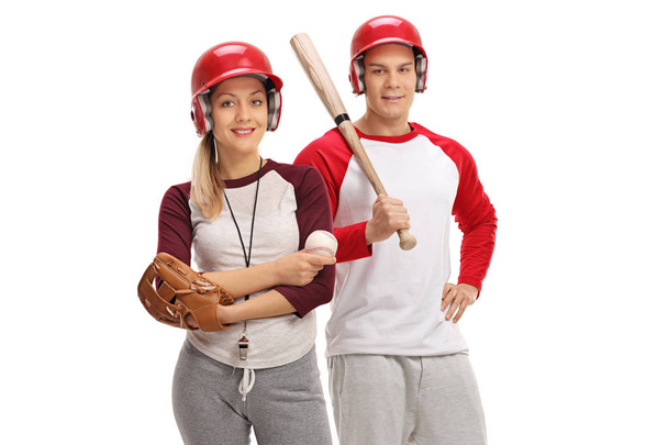 Man and woman with baseball equipment - Valokuva, kuva