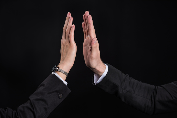 Businesspeople giving high five - 写真・画像