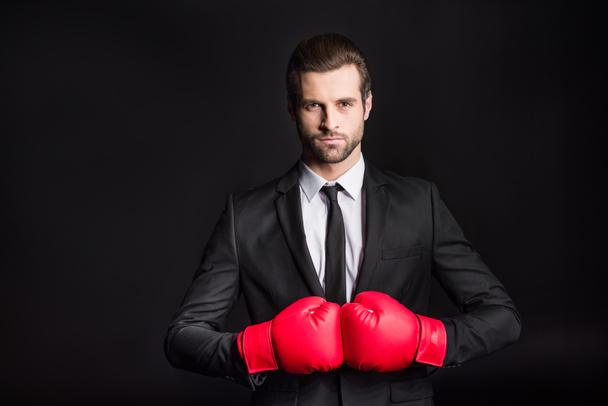 Businessman in boxing gloves - Foto, imagen