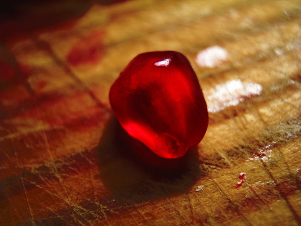 One pomegranate grain - Foto, afbeelding