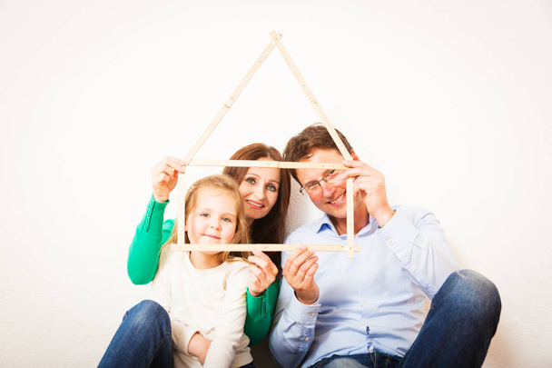 Family Of Three With House Shape - Foto, imagen