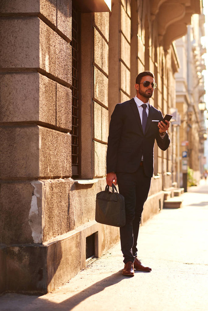 Young businessman on the street - Фото, изображение