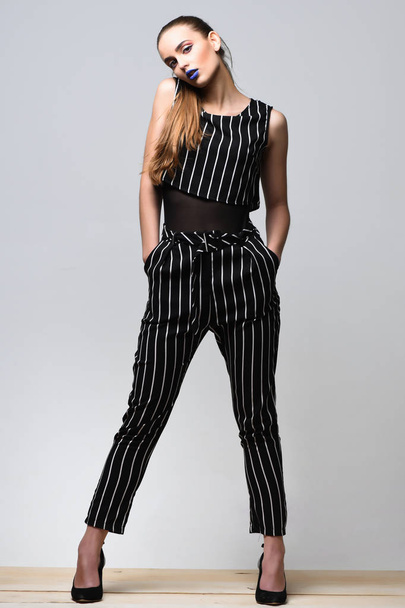 Pretty girl in striped suit - Fotografie, Obrázek