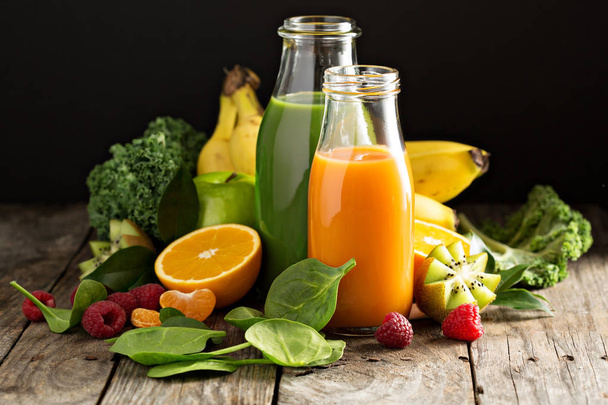 Variety of fresh vegetable and fruit juices - 写真・画像