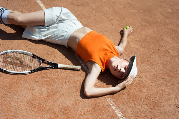 Young girl playing in tennis.  - Foto, immagini