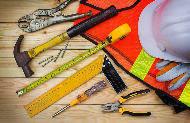 Construction tools on worker desk - Foto, afbeelding