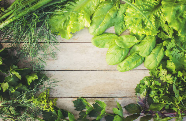 green vegetables on a wooden background. Selective focus. - Foto, Imagen