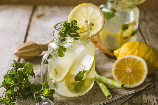Classic lemonade in glass jars - 写真・画像