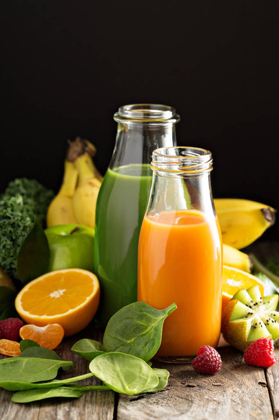 Variety of fresh vegetable and fruit juices - 写真・画像