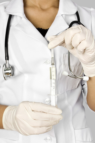 syringe in a hand - Photo, image