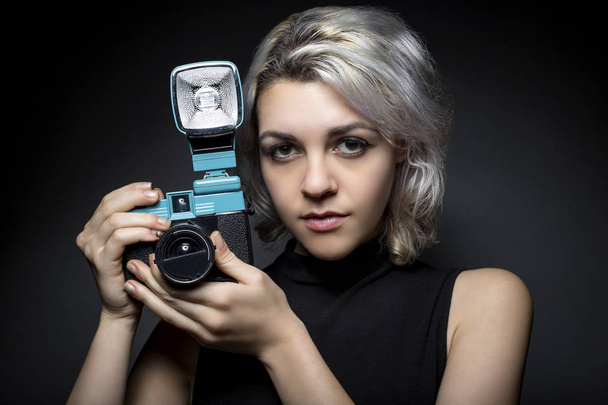 Traditional Photographer with Vintage Plastic Film Camera - Foto, imagen