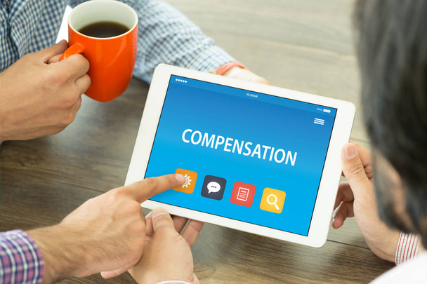 COMPENSATION CONCEPT ON TABLET  - Foto, immagini