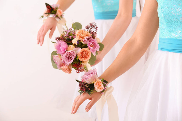 Bride holding wedding bouquet and bridesmaids  - Fotó, kép