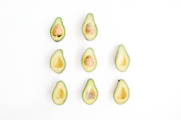 Sliced raw avocados arrangement. - Photo, image