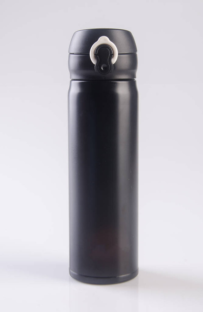 Thermo or Thermo flask on a background. - Fotó, kép