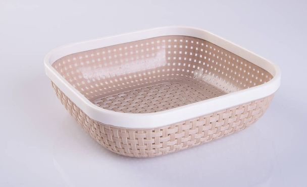 basket or empty plastic basket on a background. - Valokuva, kuva