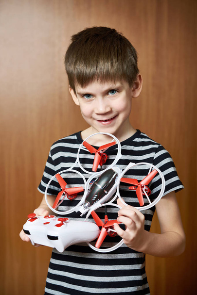 Little boy with toy quadcopter drone - Fotoğraf, Görsel
