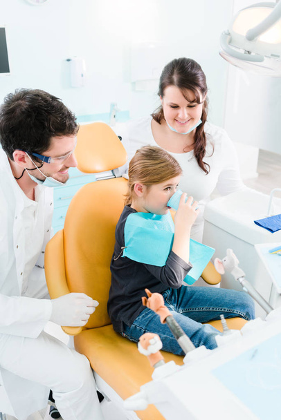 Dentist treating child  - Фото, зображення
