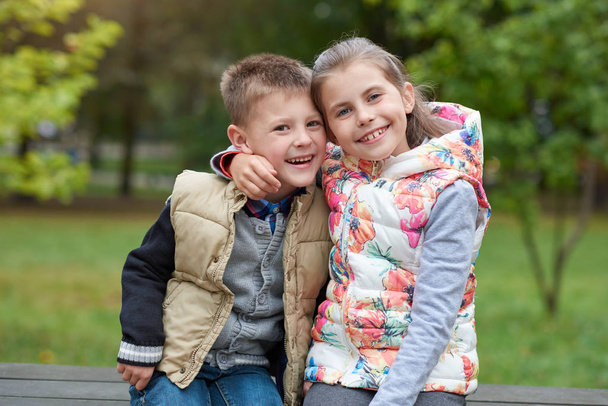Little brother and sister hugging - Фото, изображение