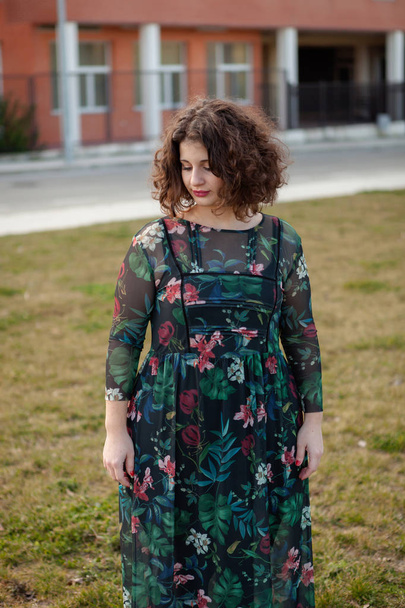 curvy girl with flowered dress - Photo, Image