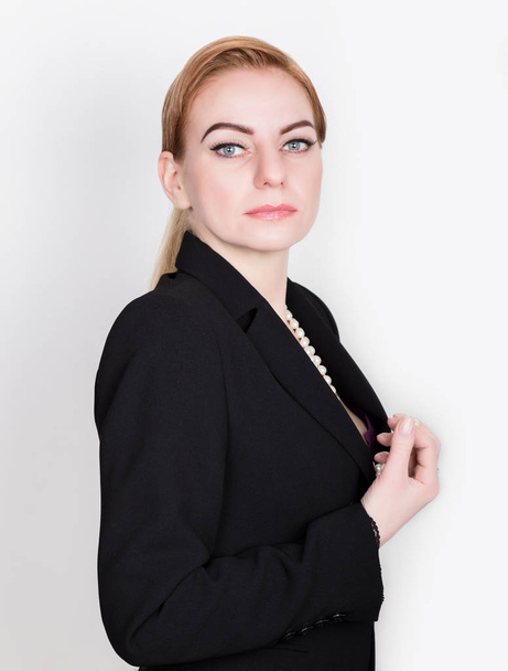 Attractive and energetic business woma in a suit on naked body smiling - Fotografie, Obrázek