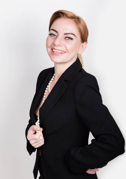 Attractive and energetic business woma in a suit on naked body smiling - Photo, Image