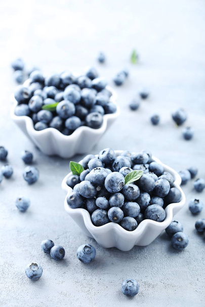 Ripe and tasty blueberries on table - Fotoğraf, Görsel