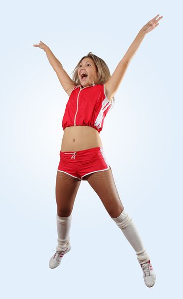 Cheerleader tyttö hyppääminen
 - Valokuva, kuva