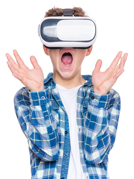 Teen boy in VR glasses - Фото, зображення