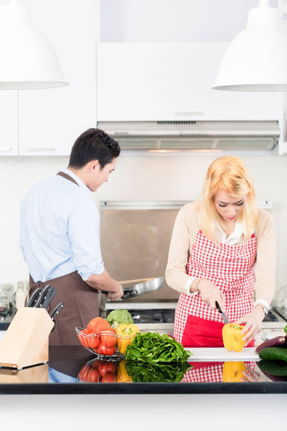 Asian couple cooking  - Photo, Image
