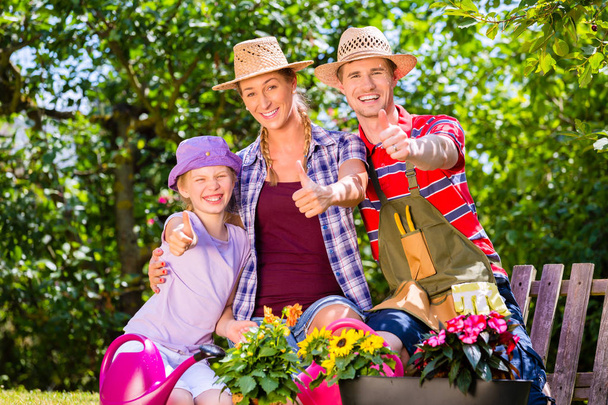 Family gardening in garden - Photo, Image