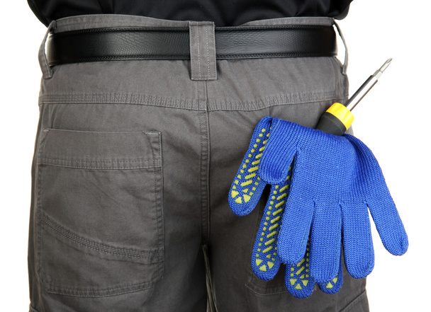 gloves and instruments in back pocket close-up - Photo, image